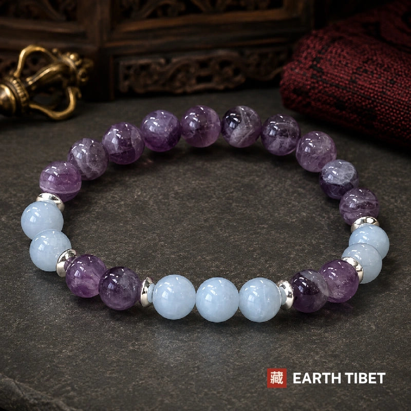 Top view of the amethyst aquamarine bracelet showing three pale blue beads set at the front