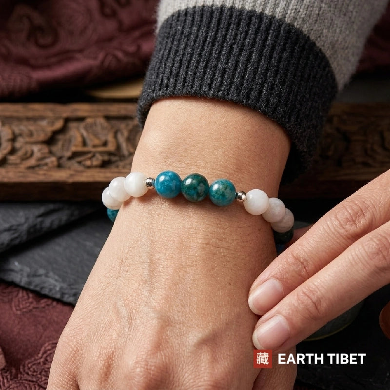 Apatite white agate bracelet photographed on slate