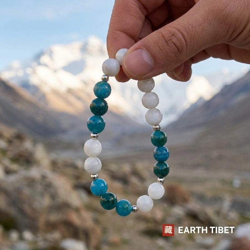 Apatite white agate clarity bracelet worn on the wrist