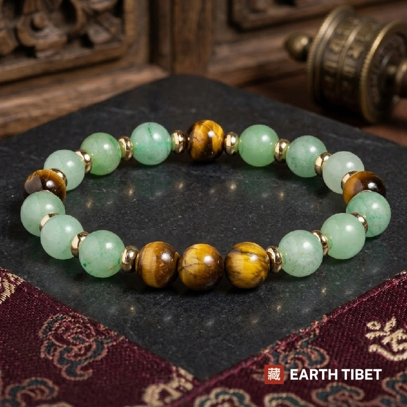 Aventurine tiger eye luck bracelet showing the chatoyant band of light across the tiger's eye beads
