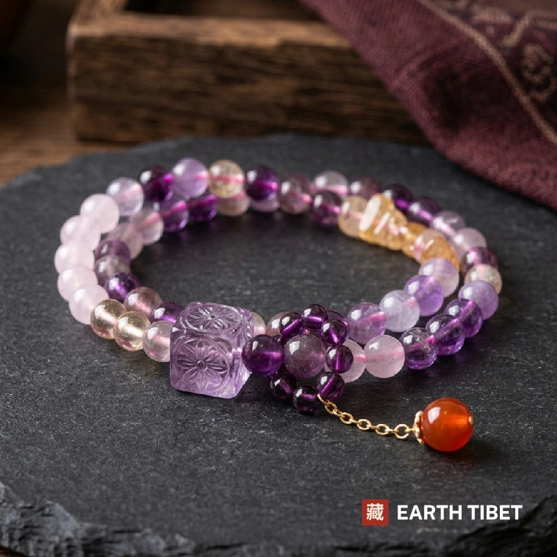 Amethyst bracelet showing the graded sweep from deep purple through lilac into gold