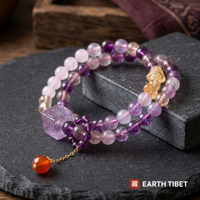 Carved amethyst focal bead and rosette cluster with the carnelian charm on its gold chain