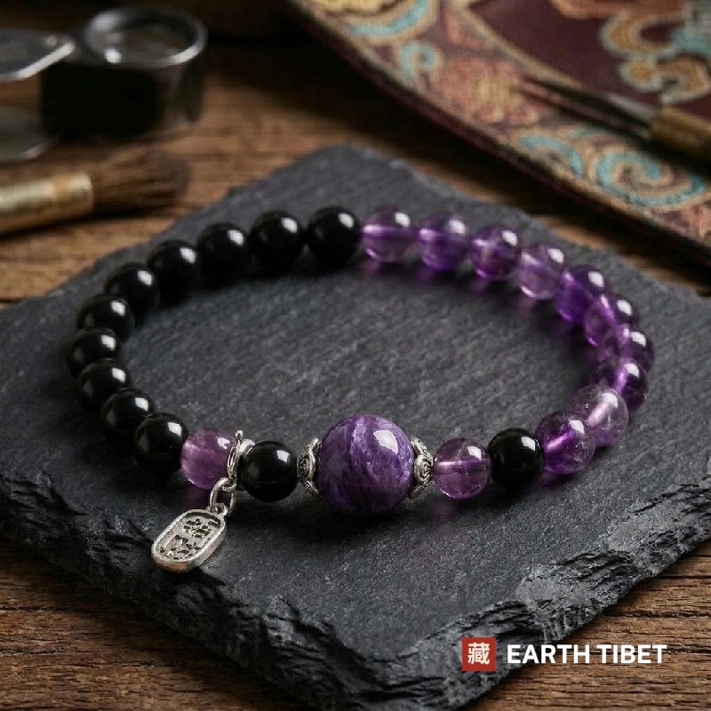 Charoite, amethyst and black obsidian stretch bracelet on slate