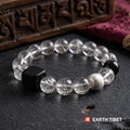 Clear quartz bracelet with a matte ebony cube and brushed silver barrel on dark slate