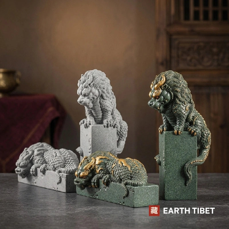 Coiled dragon statues in both postures and both finishes on a stone surface