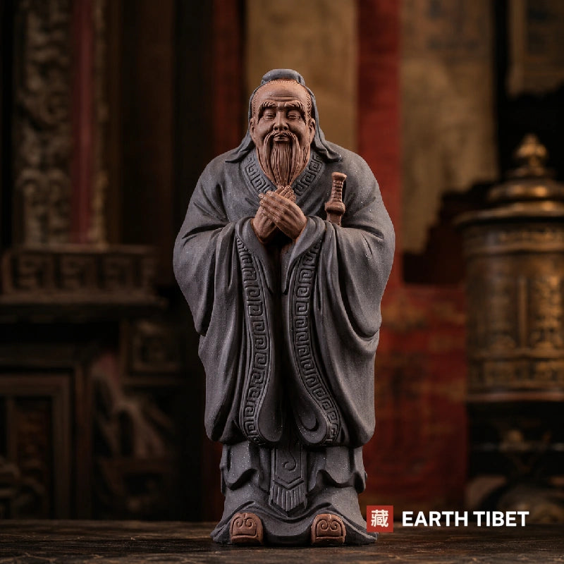 Confucius wisdom statue in high-fired ceramic, sword at the shoulder and key-fret border down the robe