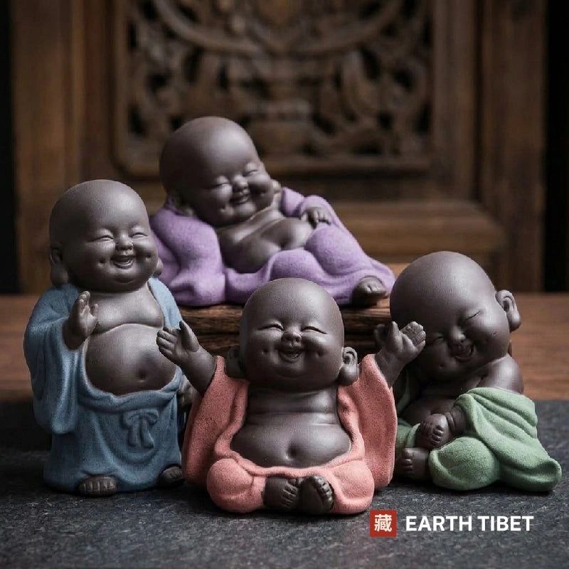 Baby laughing Buddha figures in purple clay, standing, sitting, laying and thinking