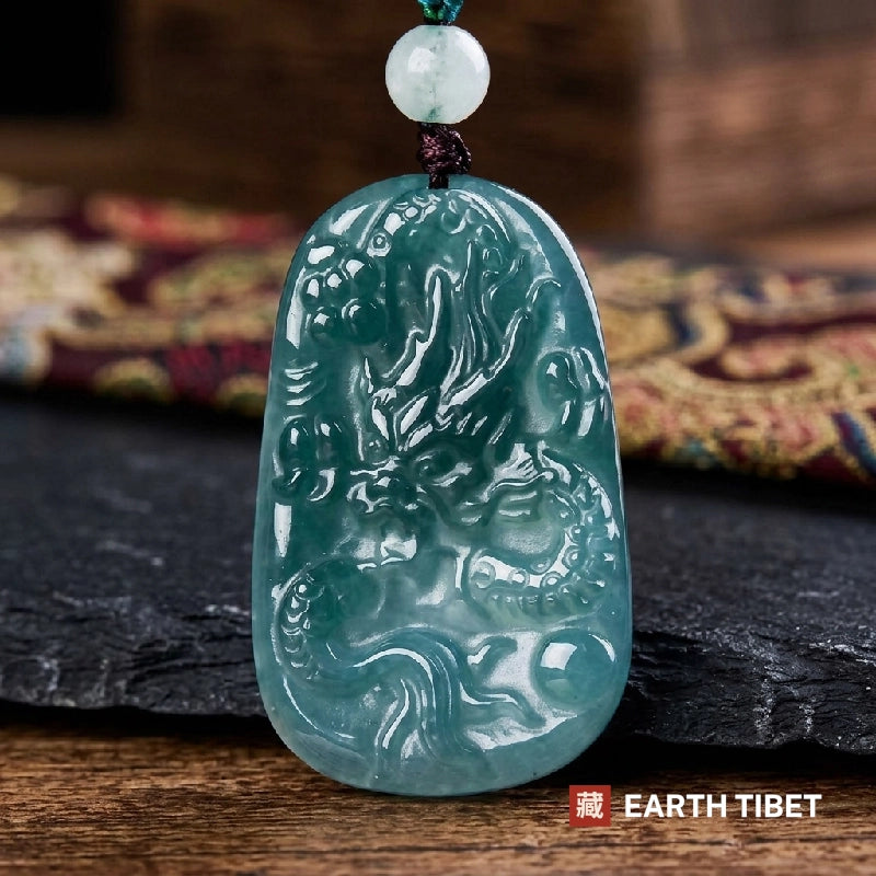 Close view of the carved dragon, the flaming pearl and the waves beneath it