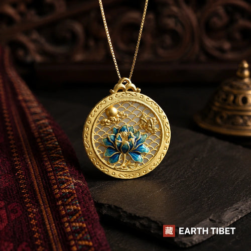 Blue lotus openwork pendant hanging on a box chain against carved wood