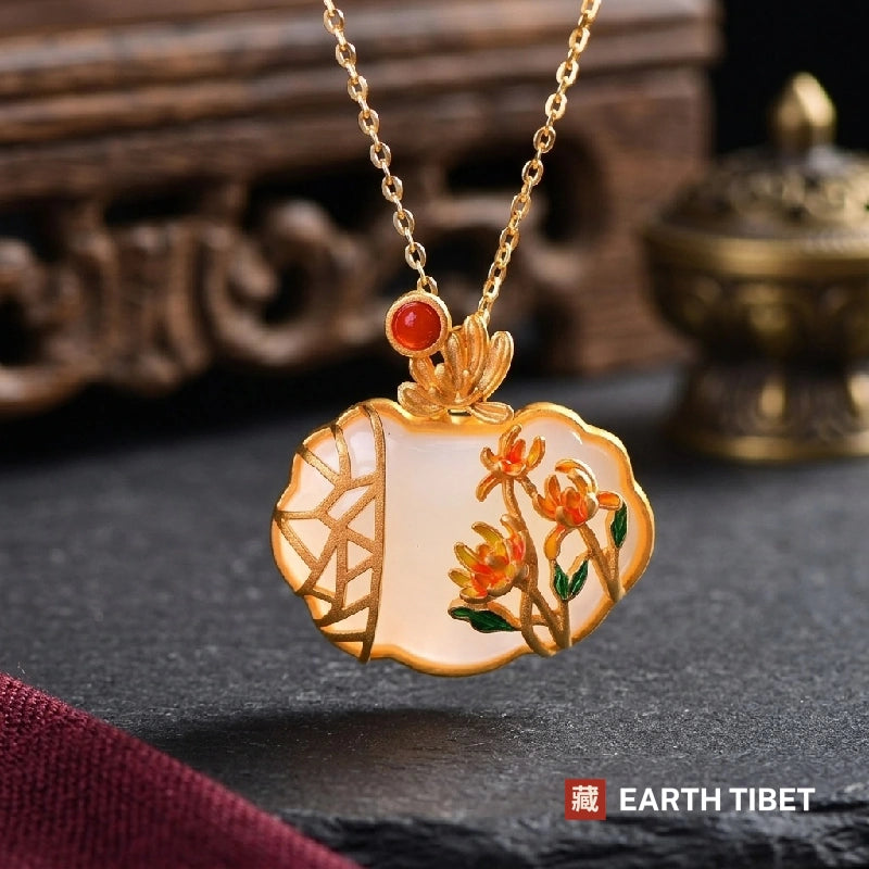 White agate ruyi lock necklace with enamel chrysanthemums and a gold garden lattice, on a gold plated silver chain