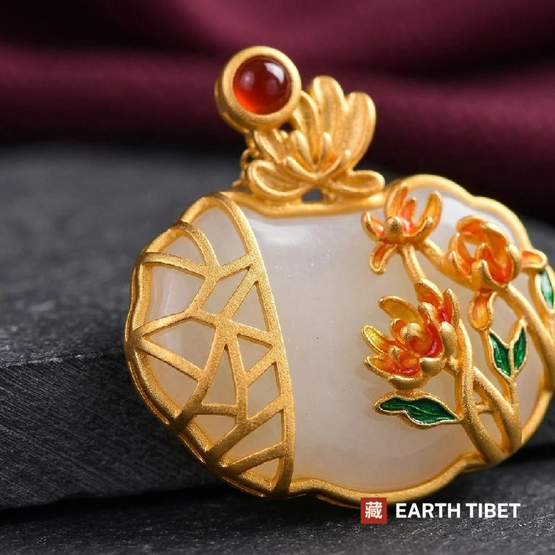 Close up of the enamel chrysanthemums and ice-crack garden lattice on the white agate ruyi lock pendant