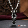 Antiqued steel Chinese dragon head pendant on a wheat chain