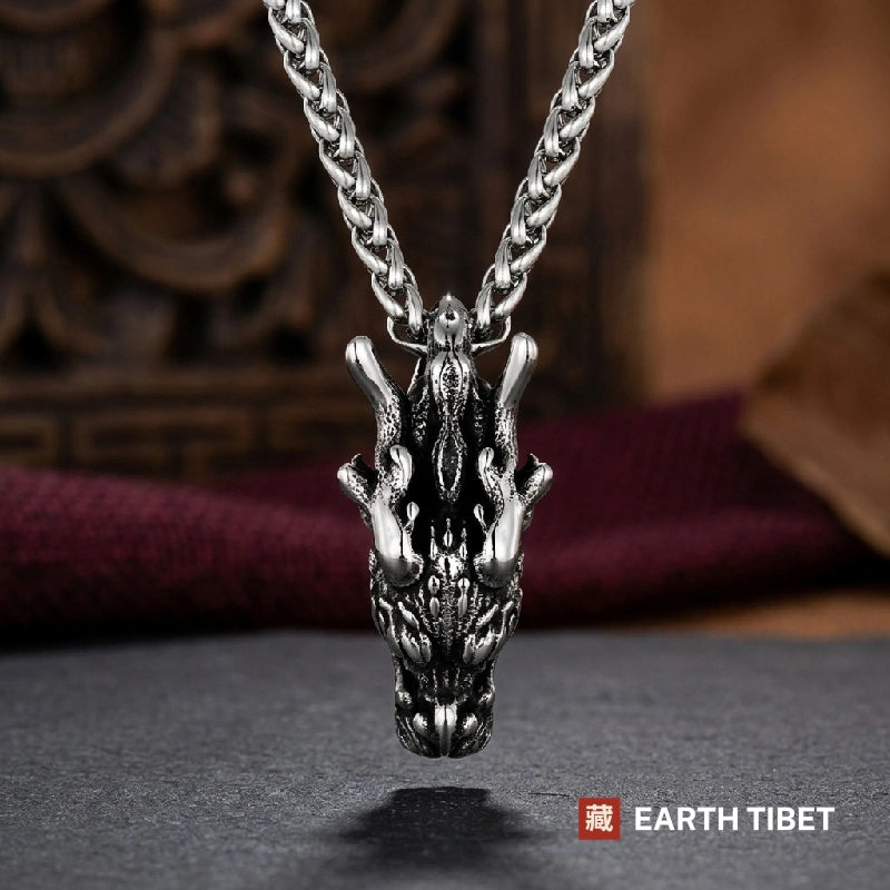 Antiqued steel Chinese dragon head pendant on a wheat chain