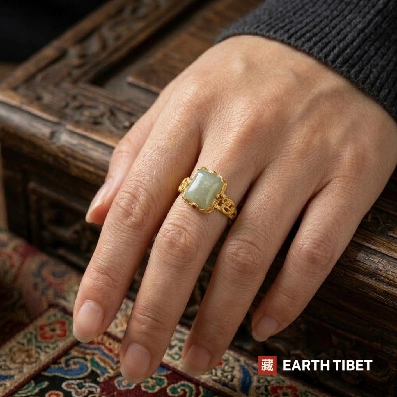 Green chalcedony square ring worn on a hand