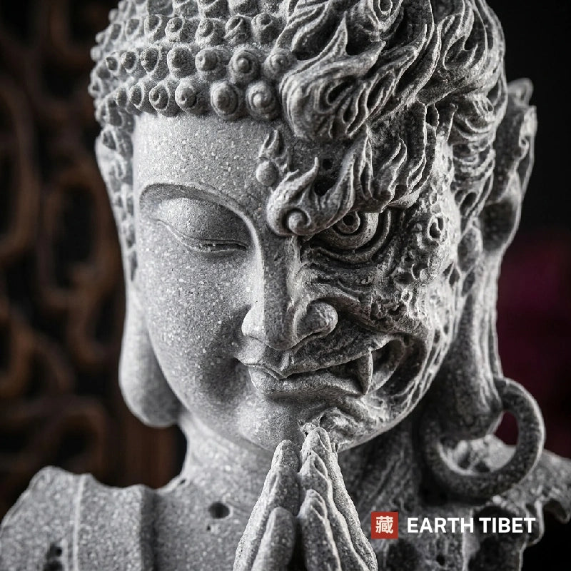 Close view of the face split down the centre, calm Buddha on one side and a snarling demon on the other