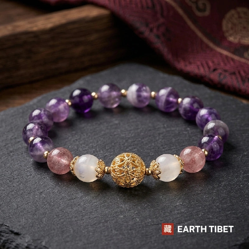 Moonstone, strawberry quartz and amethyst bracelet with a gold filigree bead at the front