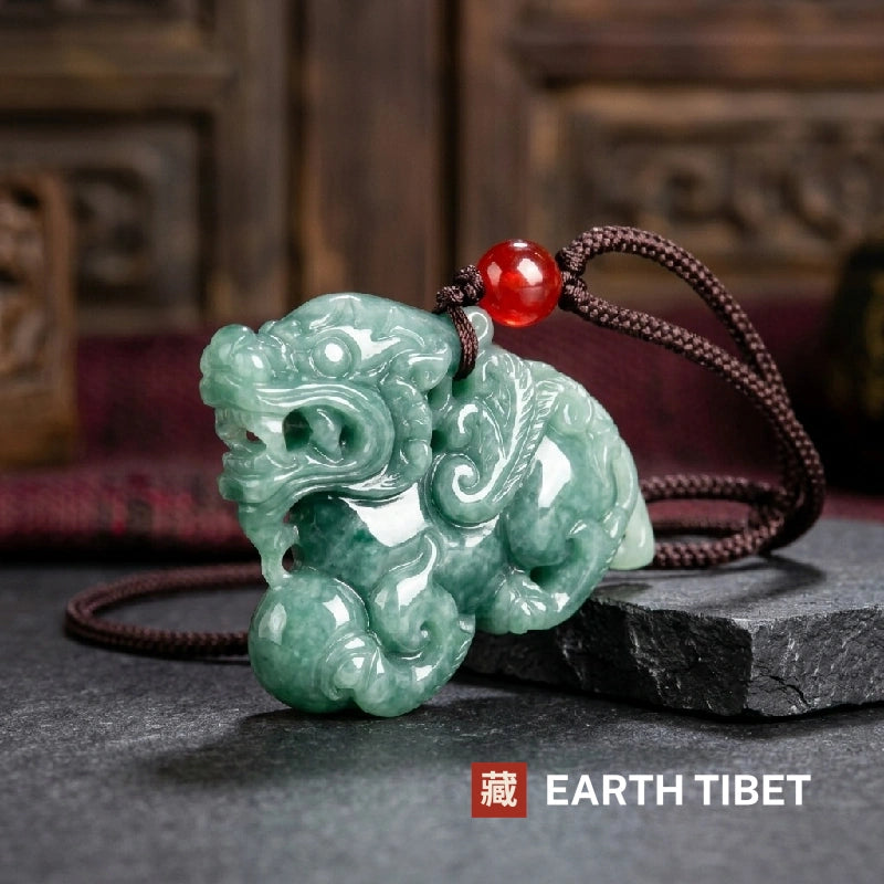 Reverse side of the jadeite pixiu pendant, one paw resting on a ball