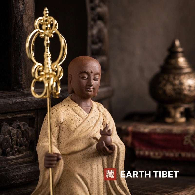 Ksitigarbha statue holding the cintamani wish-fulfilling jewel