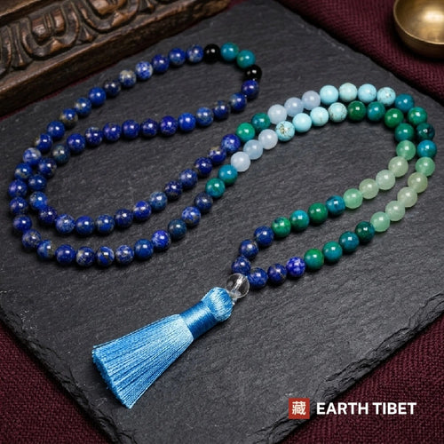 Full 108 bead lapis lazuli mala on slate, deep blue running into turquoise and green