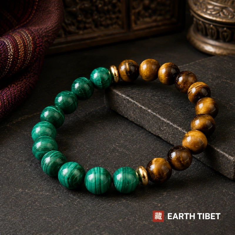 Malachite tiger eye bracelet in a loop on slate, green one side and gold-brown the other