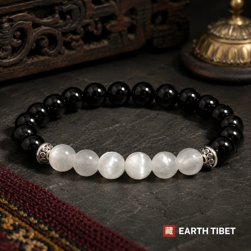 Black onyx and selenite balance bracelet in 8mm beads on slate