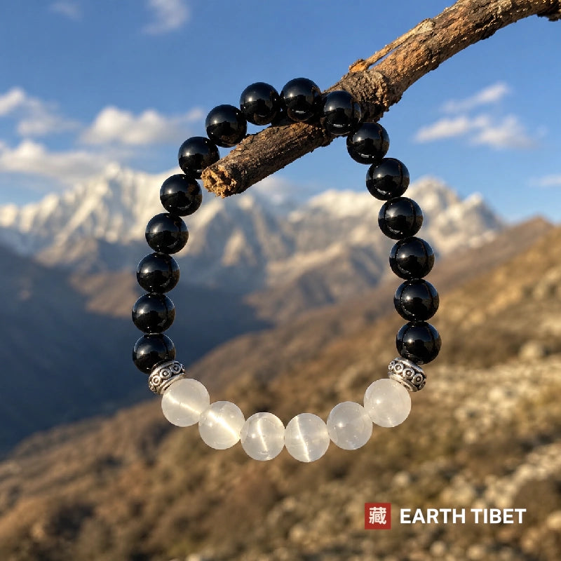 Black onyx and selenite balance bracelet worn on the wrist