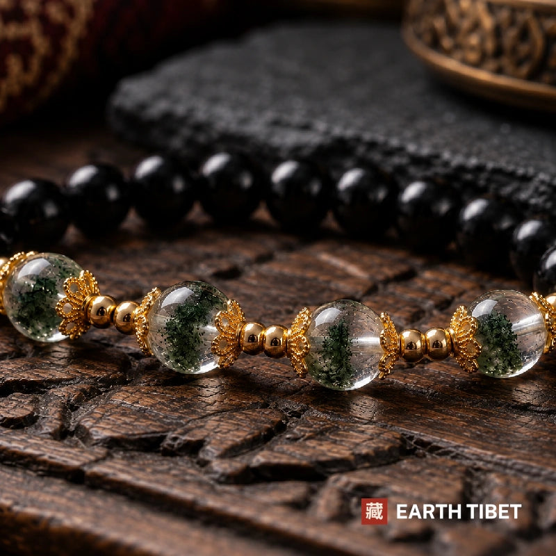 Close view of green chlorite inclusions suspended inside clear phantom quartz beads