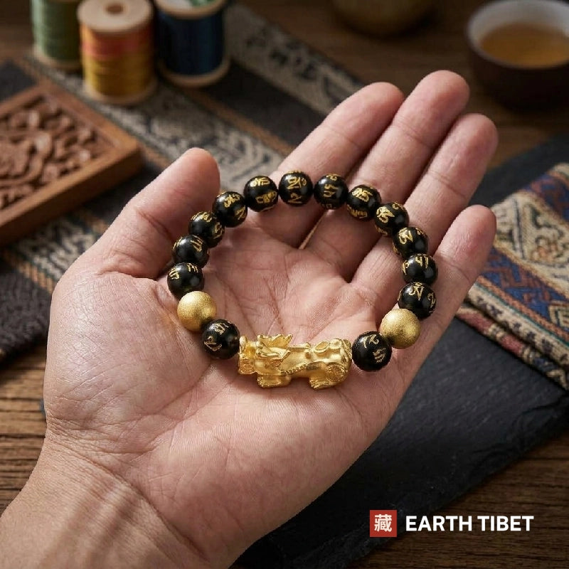 Pixiu bracelet resting in an open hand to show its size