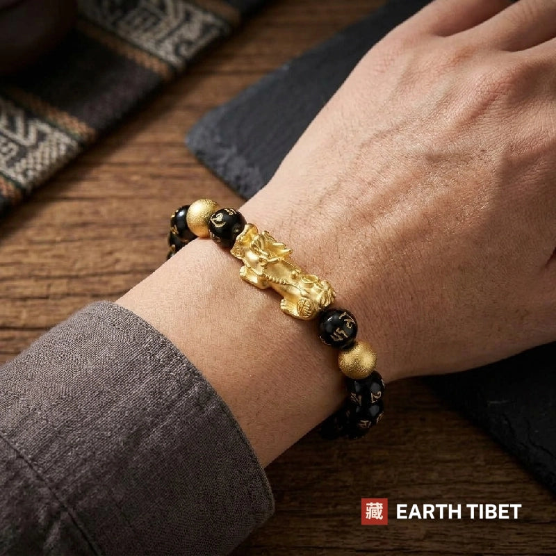 Pixiu bracelet worn on a wrist, the charm facing outward