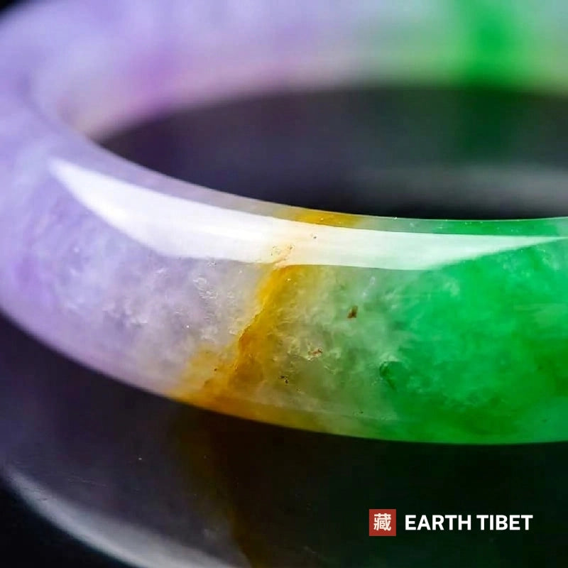 Close view of where the lavender, yellow and green meet in the bangle