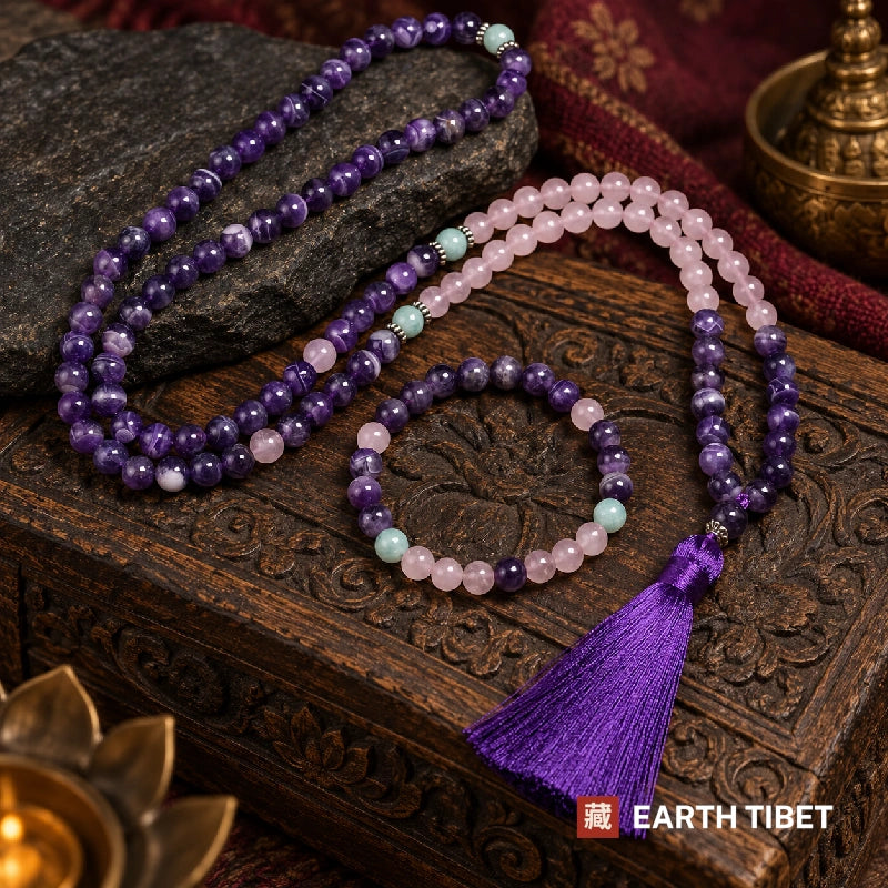 Amethyst and rose quartz 108-bead mala with matching bracelet on a carved wooden box
