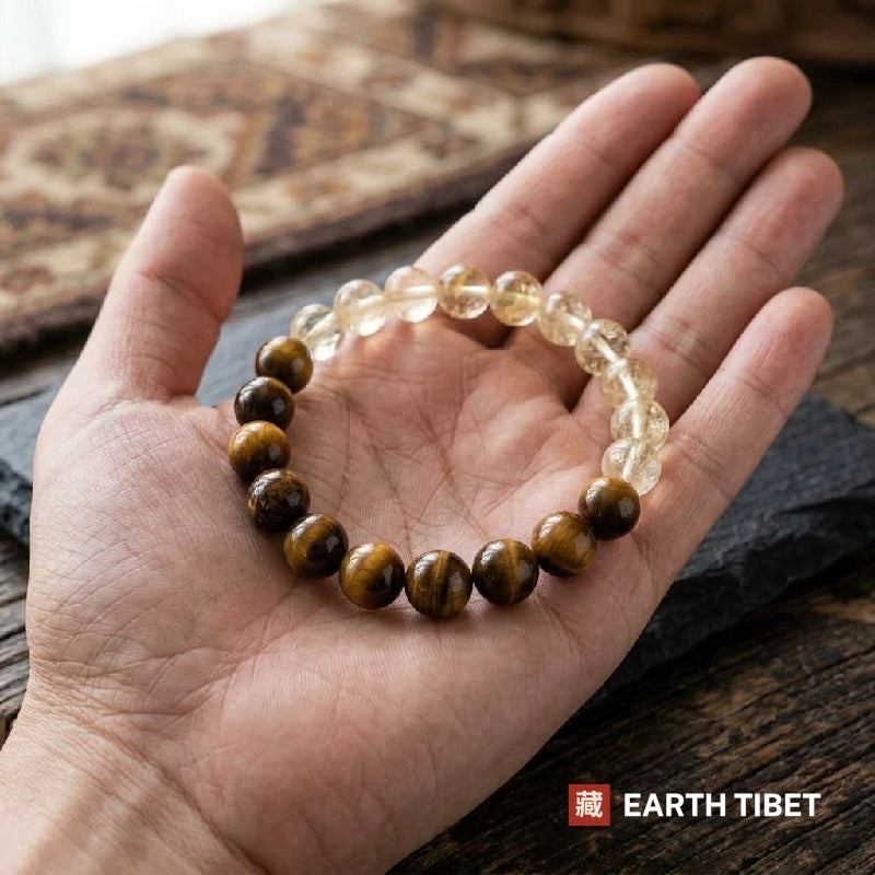 Bracelet lying in an open hand showing the split between the two stones