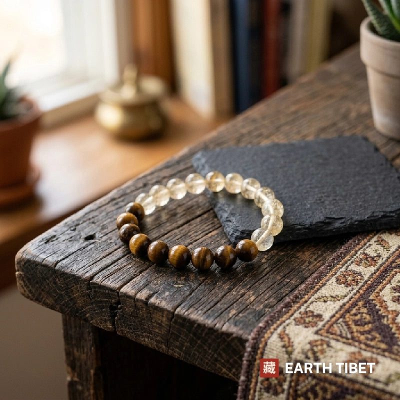 Bracelet on a wooden table with a Tibetan rug behind