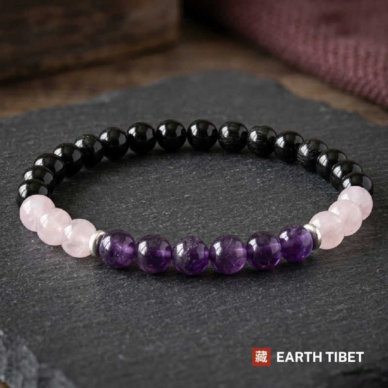 Top view showing black tourmaline round the back, rose quartz either side and six amethyst at the front