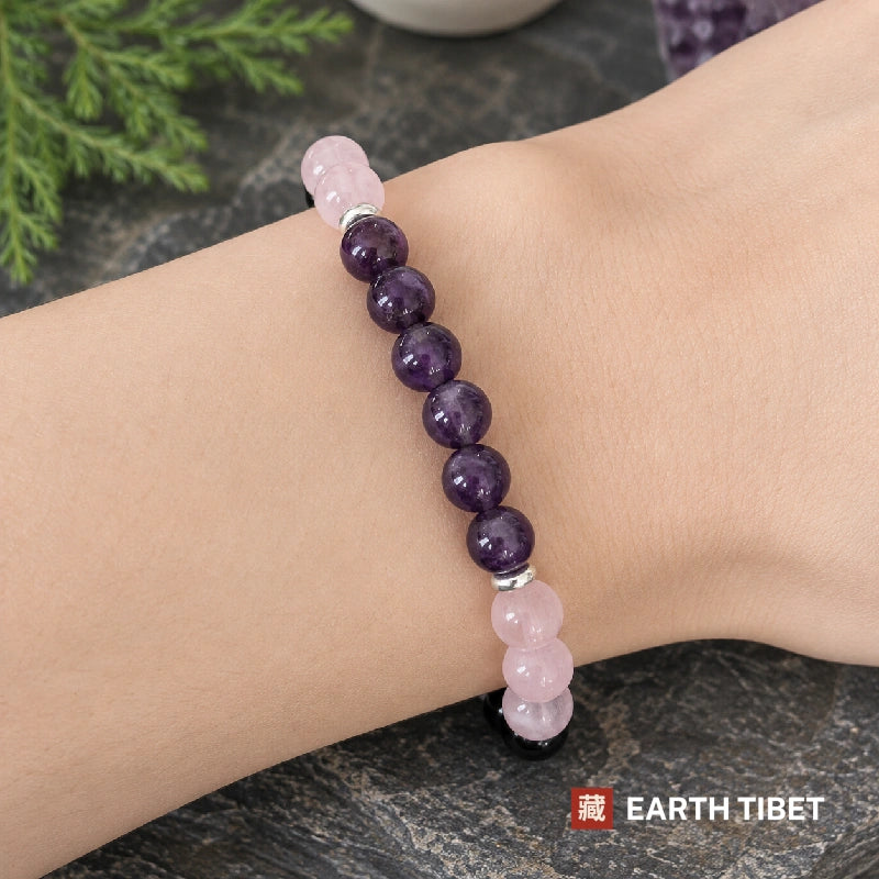 Woman wearing the black tourmaline amethyst rose quartz bracelet on her wrist