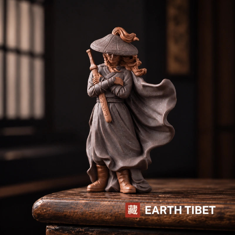 Full figure of the wandering swordsman, cloak swept out to one side