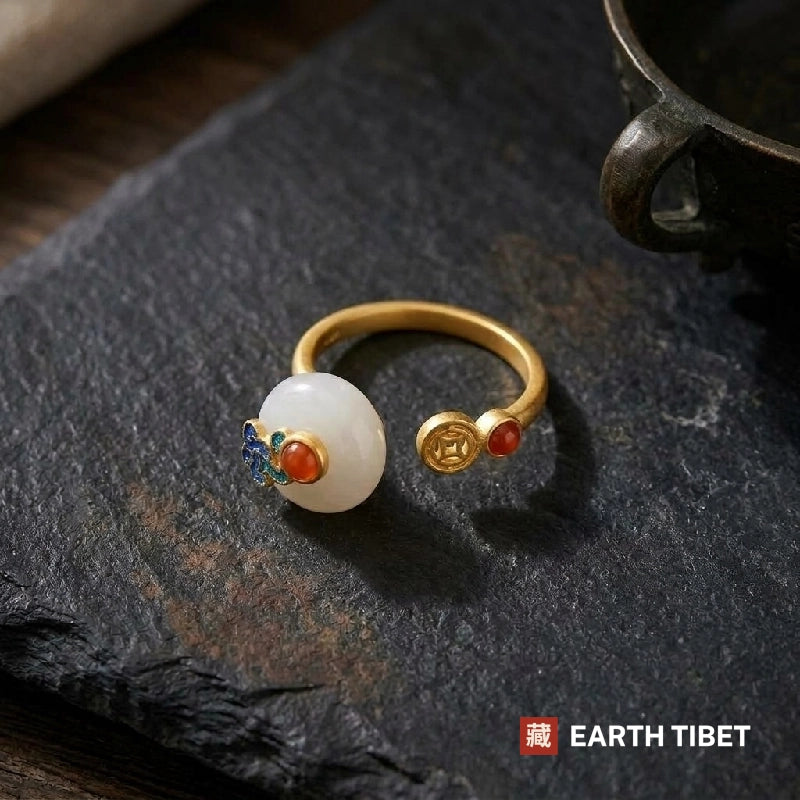 White chalcedony ring on slate, showing the open adjustable band