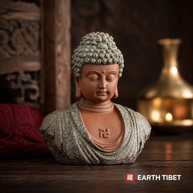 Close view of the Buddha bust showing the ushnisha and the urna at the brow